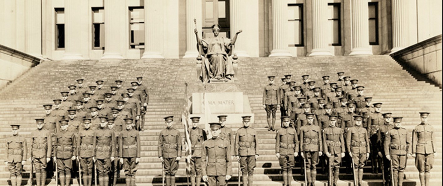 ROTC members at attention on the steps of Low Library